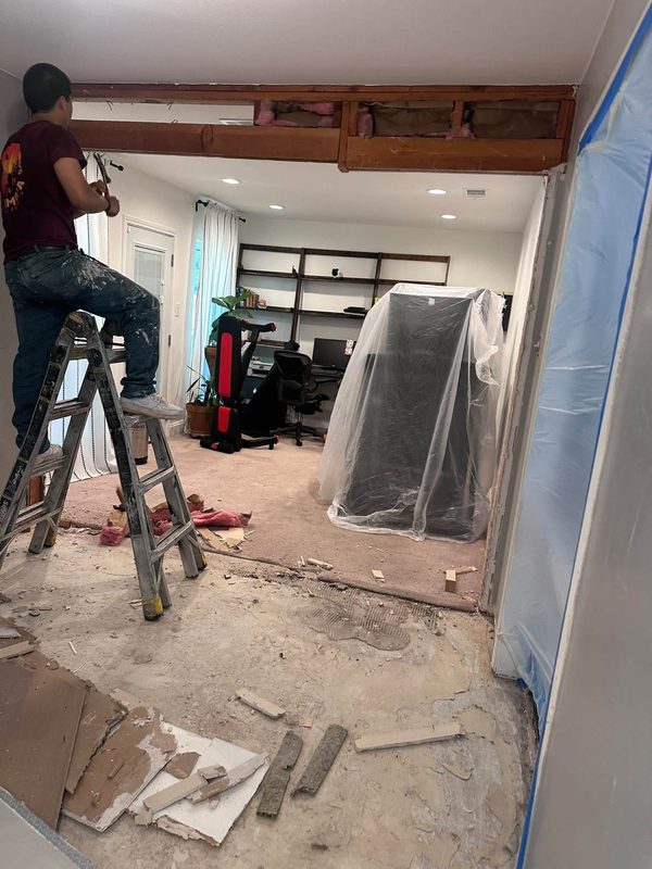 Setting a header beam while the room is opened up