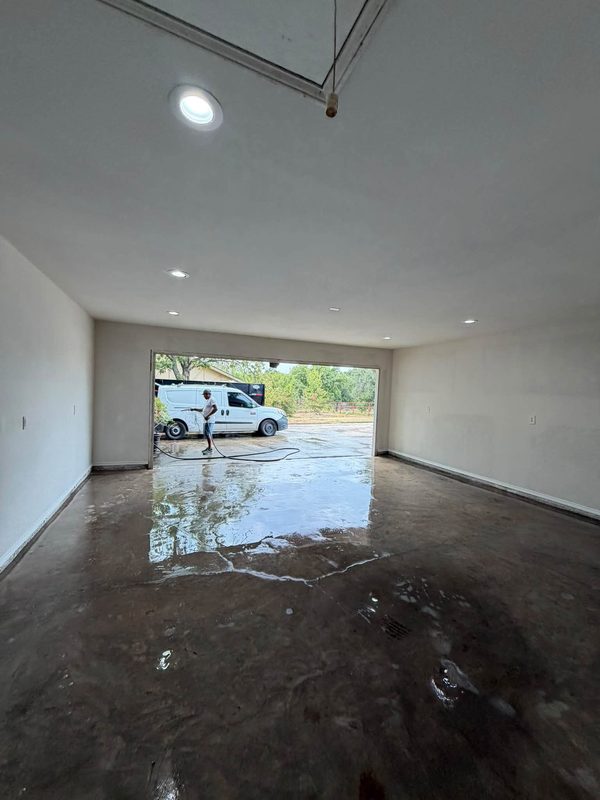 Converted garage drywalled with the opening framed for a wall