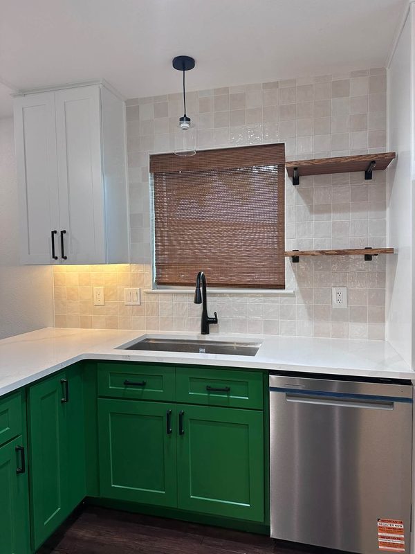 Kitchen sink wall with open shelves and a woven shade