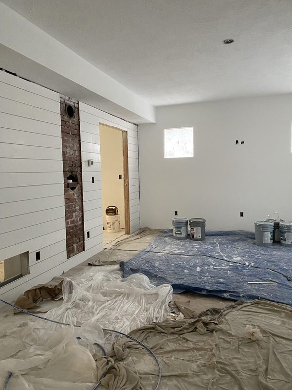 Room masked and sheeted before paint